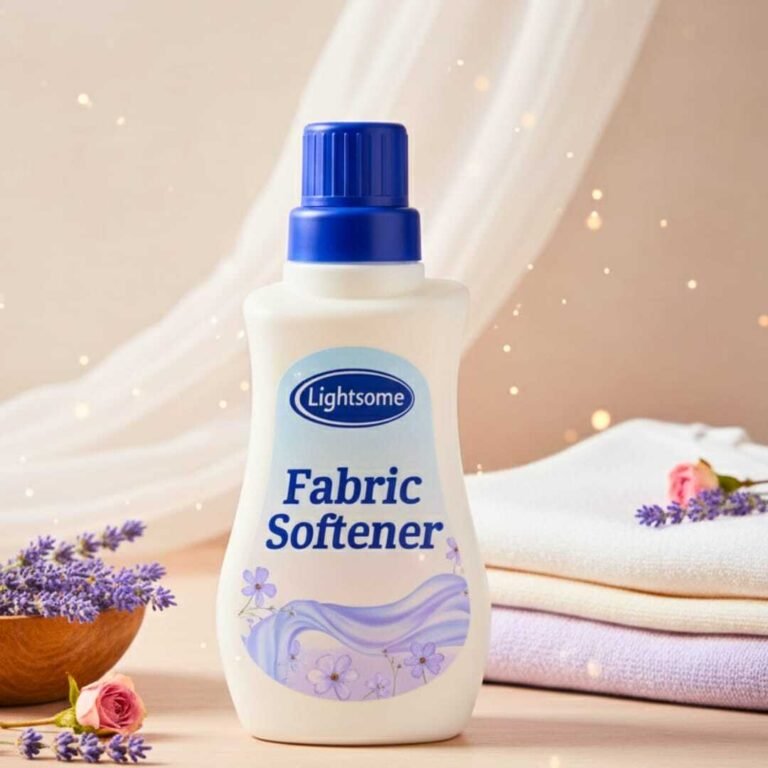 White Lightsome fabric softener bottle with blue cap, lavender, towels.