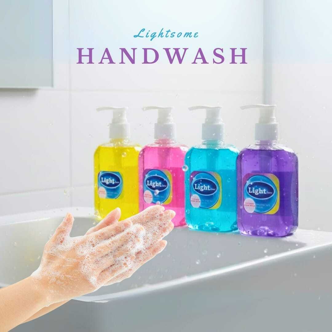 Colorful liquid handwash bottles with foam hands hygienic bathroom sink